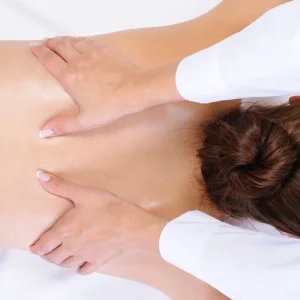 healthy-back-massage-young-woman-white-background